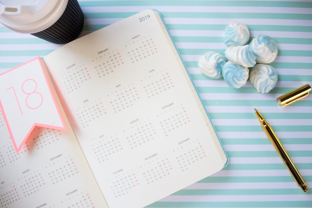 2019 calendar on white and teal surface