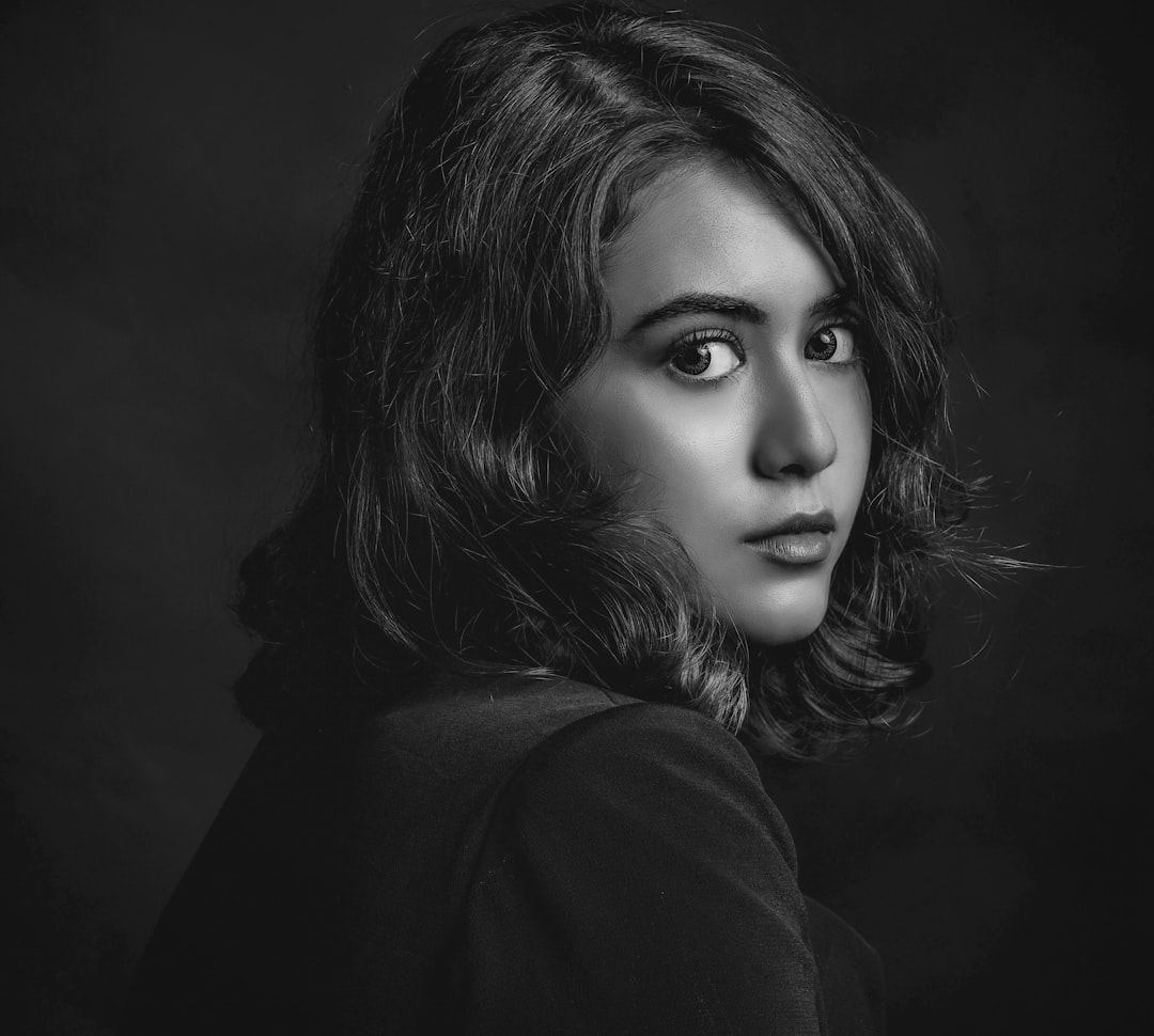 a black and white photo of a woman